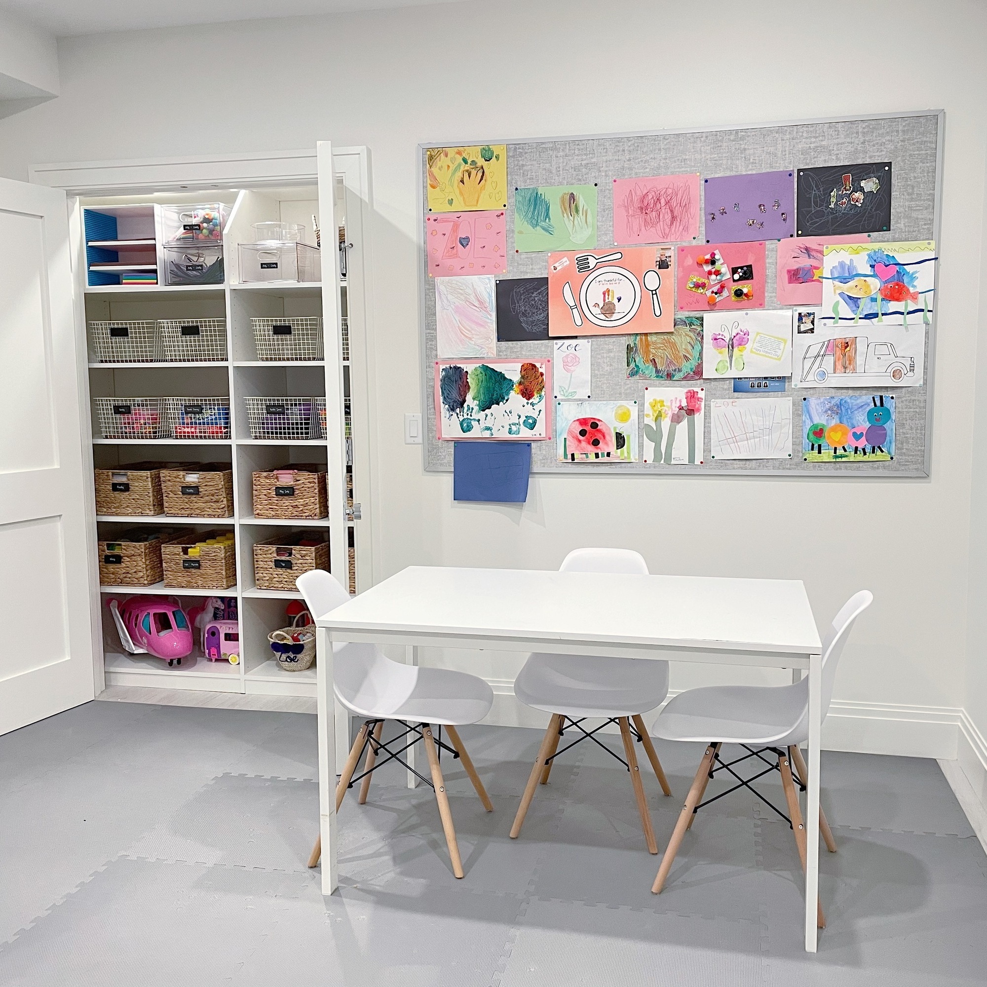 Organized artwork in a kid's room