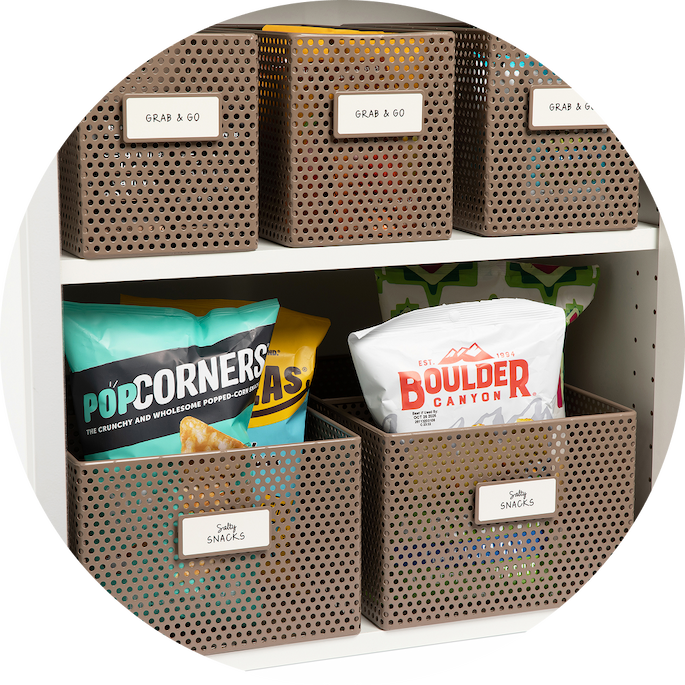 Perforated baskets holding various snacks