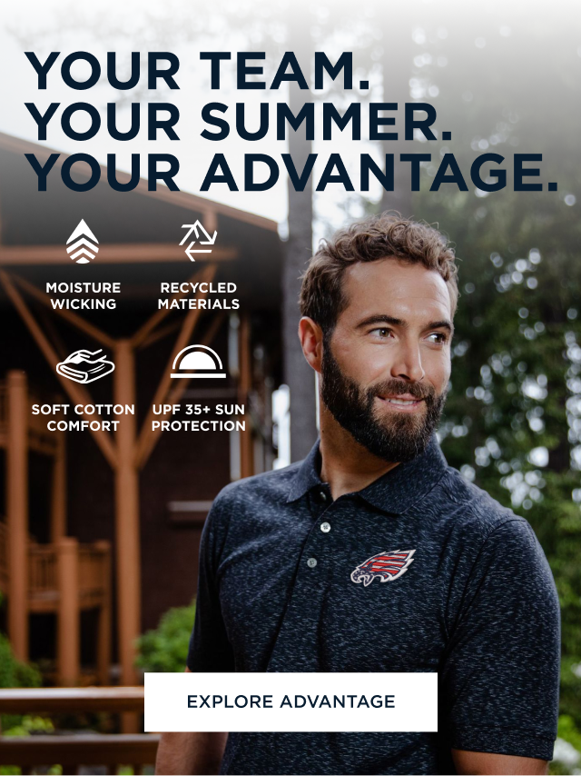 Man wearing an Advantage polo outside of a cabin | Explore Advantage