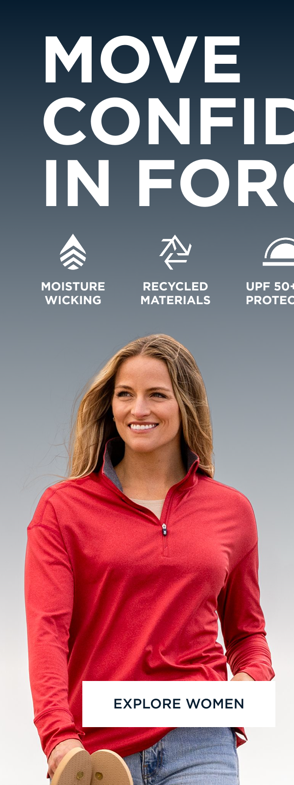 Woman walking on the beach and wearing a red quarter zip | Explore Women