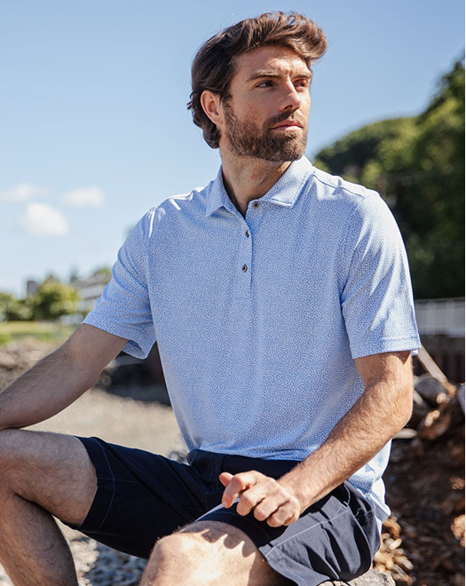 MAN WITH BOTANICAL PRINT POLO