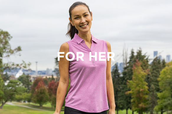 Woman wearing pink Forge Eco Performance polo on golf course | Shop Now