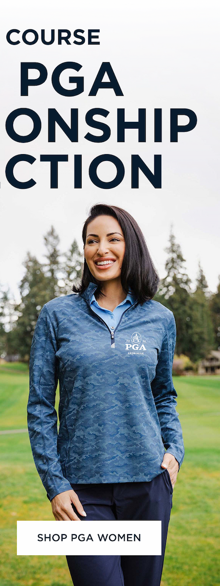 Woman on golf course smiling wearing a blue quarter zip pullover | SHOP PGA WOMEN 