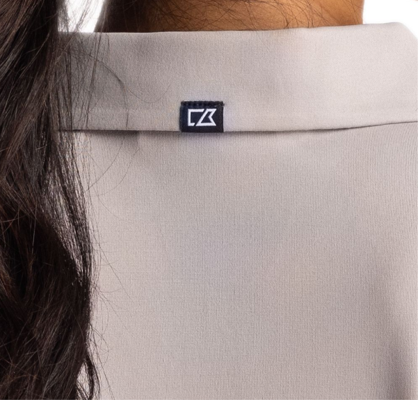 Woman wearing Forge polo