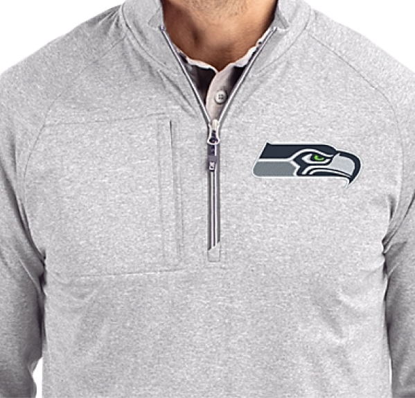 Man wearing Adapt quarter zip with logo
