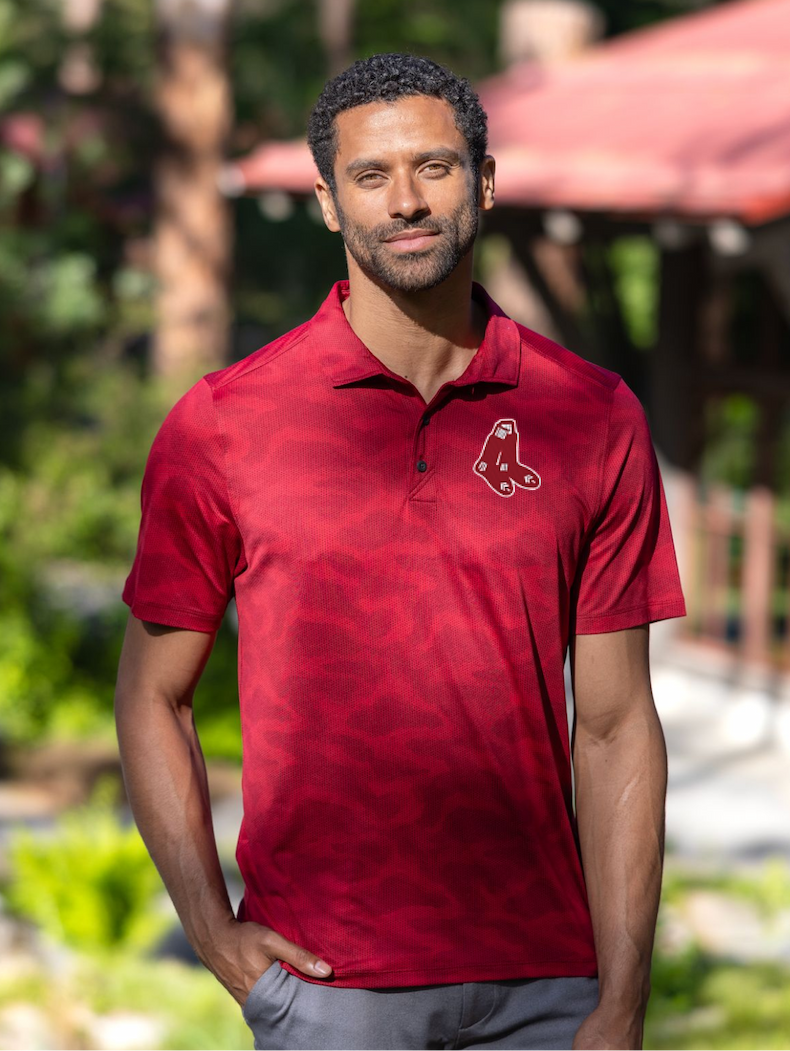 Man in Cutter & Buck Coastline Recycled Double Peached Camo Print Mens Polo