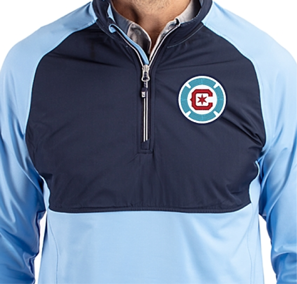 Man wearing an Adapt quarter zip