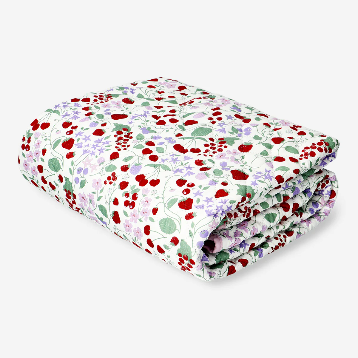 Quilted blanket with strawberry print