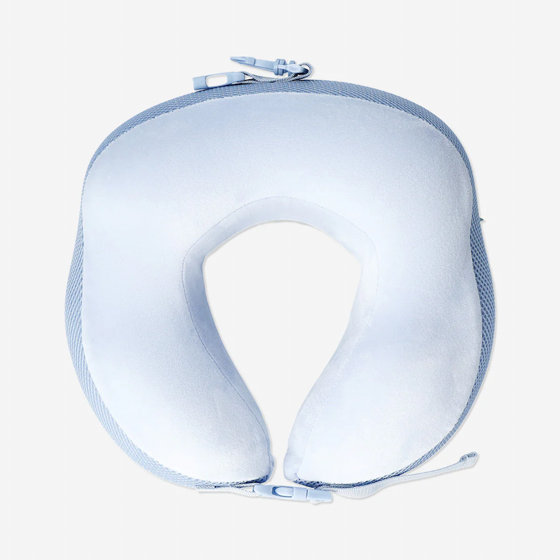 Blue memory foam travel pillow with strap clasp