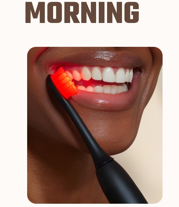 Woman using Bon Charge Red Light Toothbrush