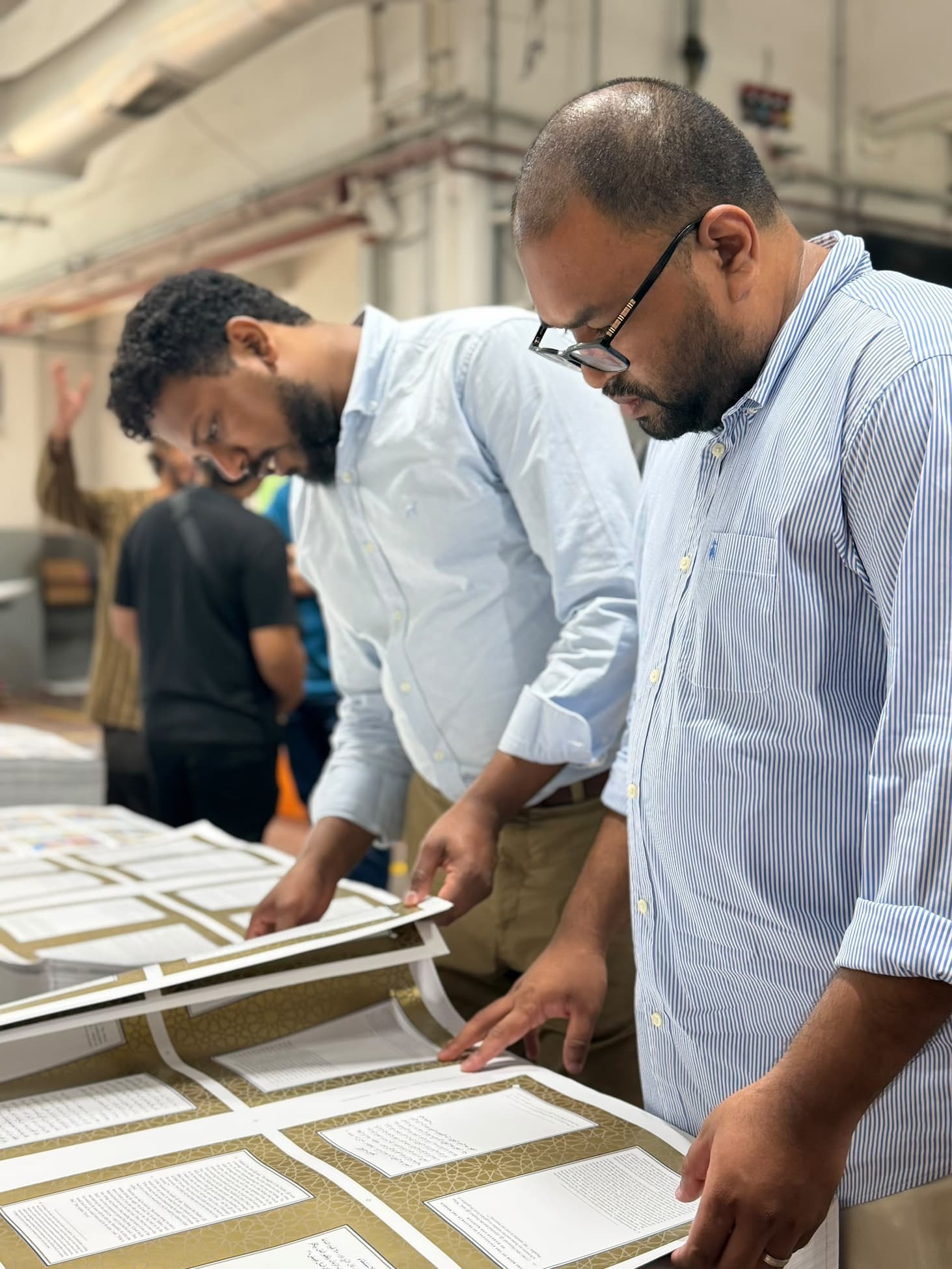 Going through the printed sheets