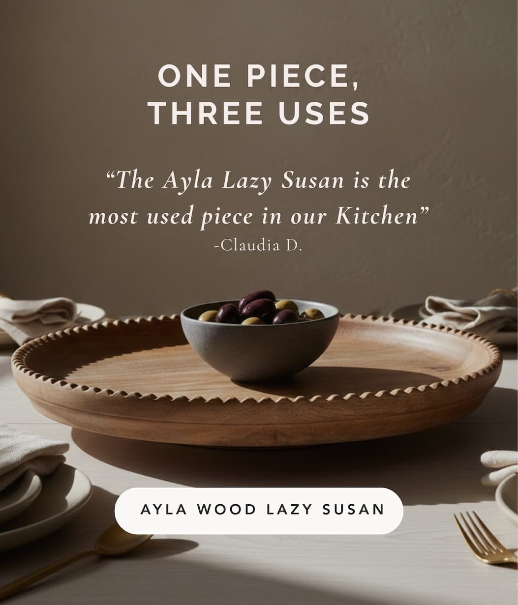 an image of a bowl of olives on a wooden tray