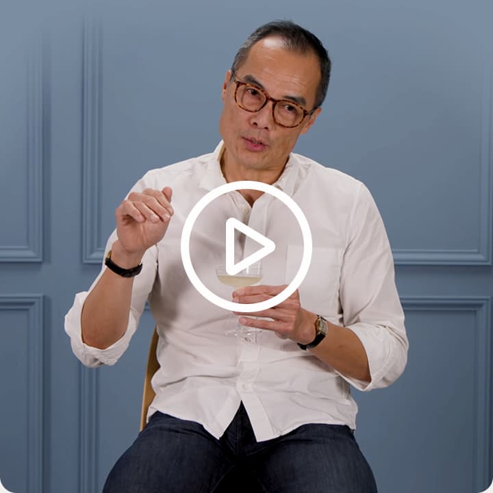 Play button over man talking