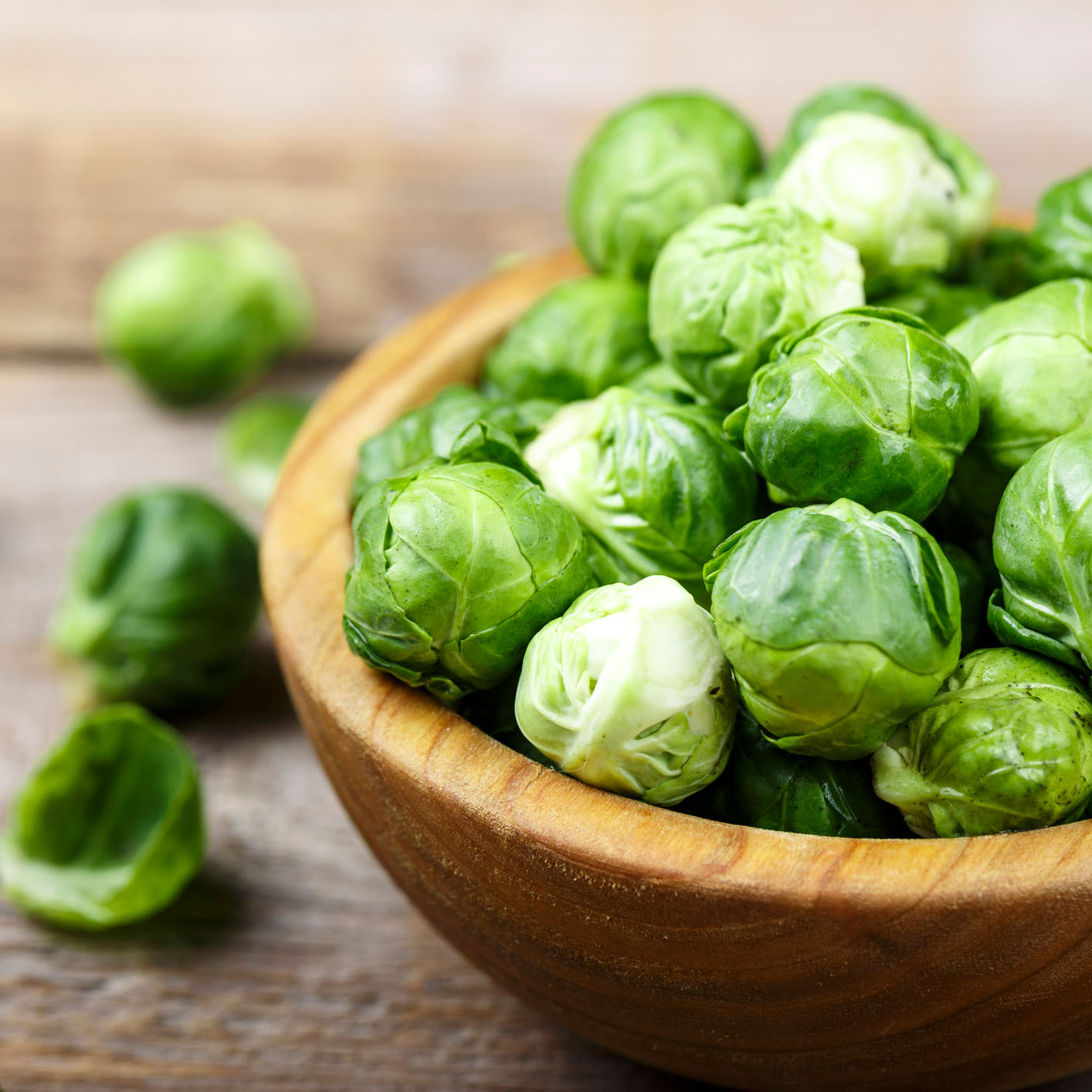 wooden bowl of brussels sprouts