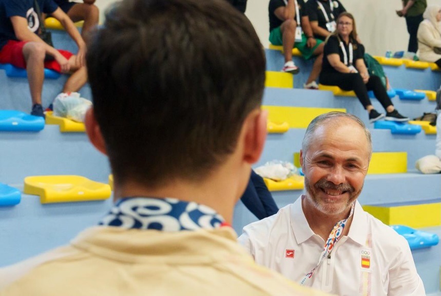 Rafa Lozano Jr embraces his father and coach Rafael Lozano Sr after winning gold