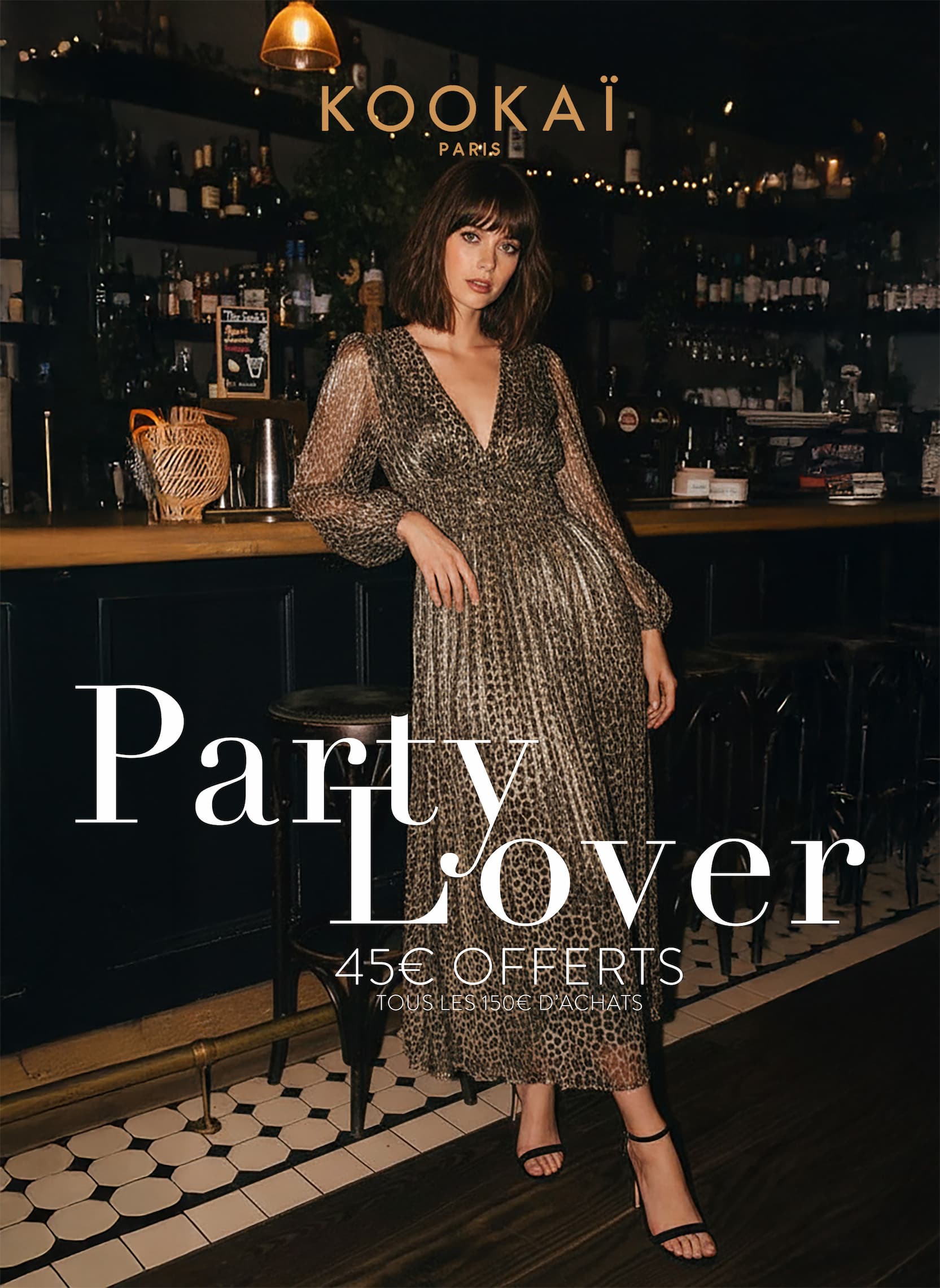 an image of a woman wearing a blue sweater and hat