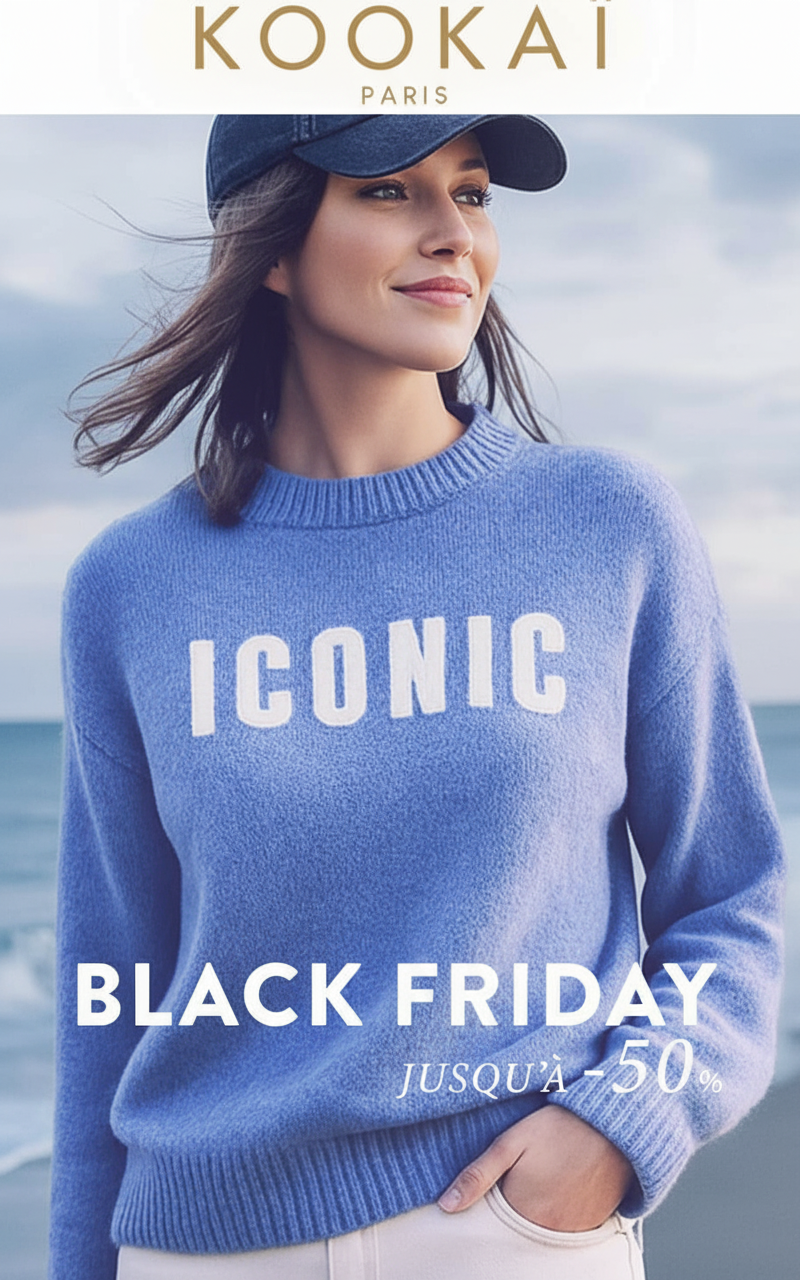 an image of a woman wearing a blue sweater and hat