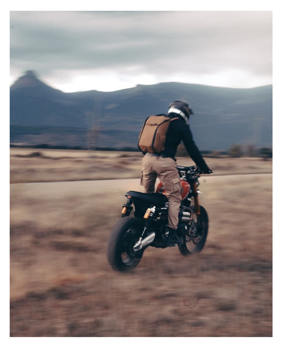 Peak Ambassador @puko.moto standing tall with a Coyote Everyday Backpack. Photo by @lp_72 (also a Peak Ambassador...)