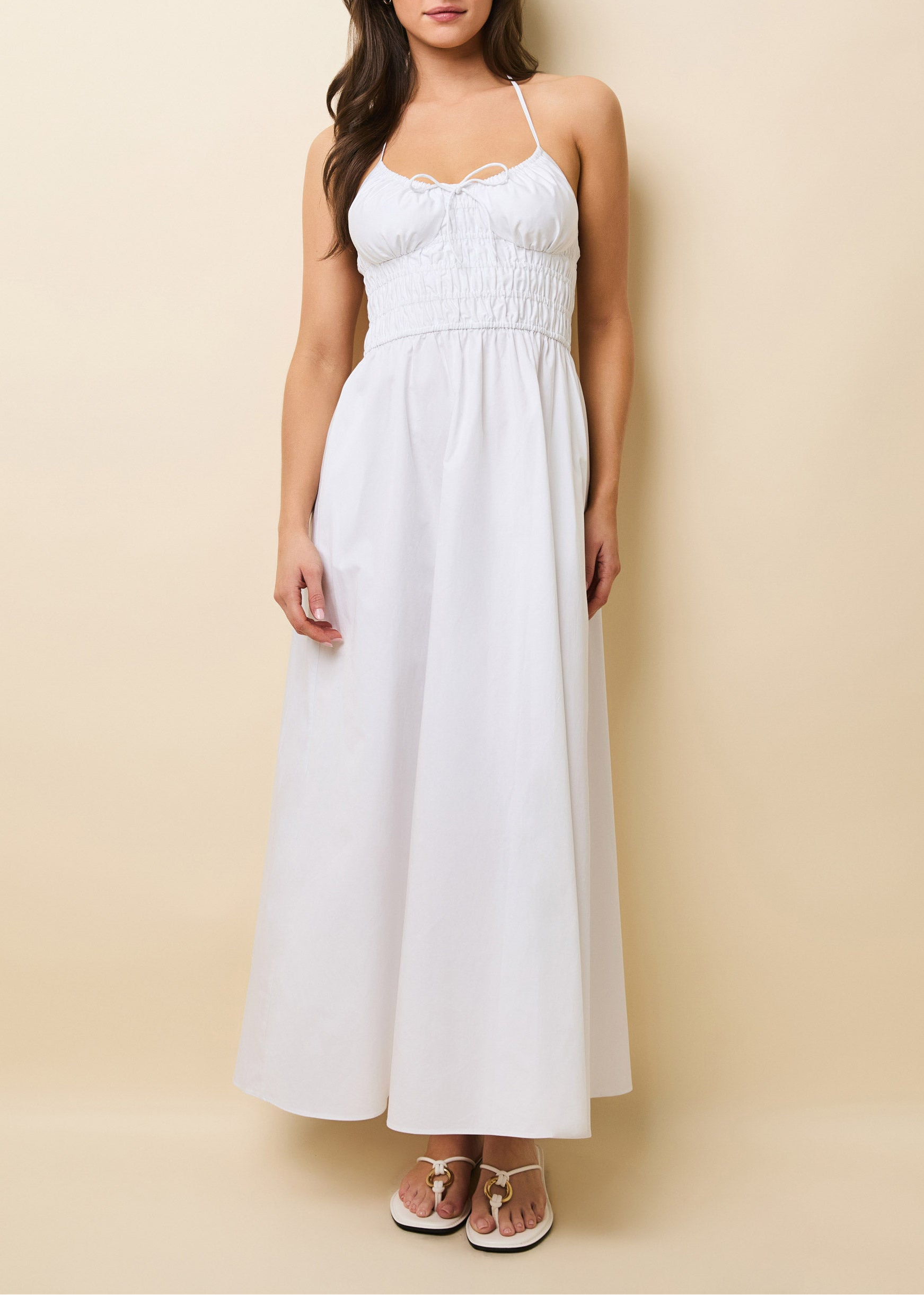 woman in white full length dress