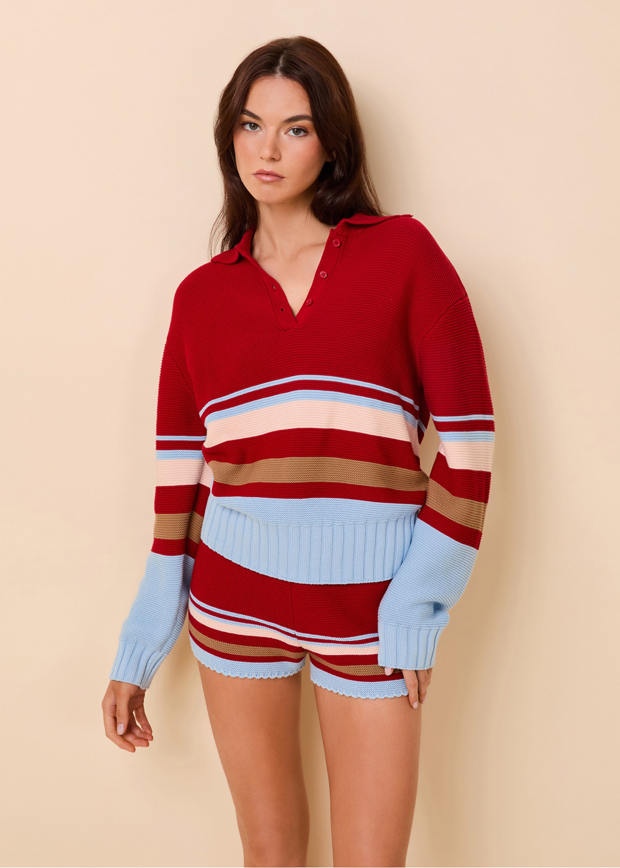woman in read and blue striped sweater