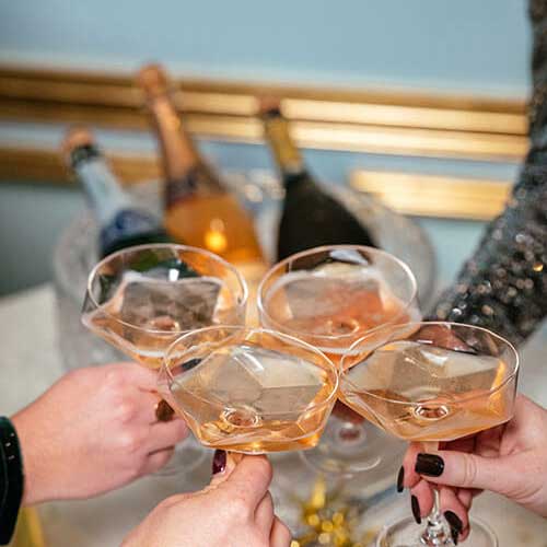 group with sparkling wine glasses