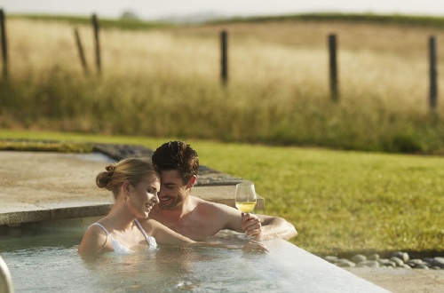 Carneros Resort - couple in outdoor hot tug