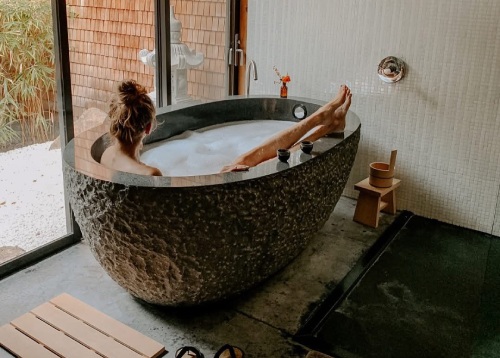 woman relaxing in tub