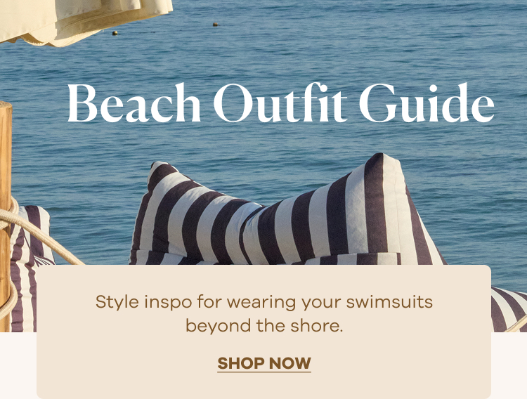 an image of a woman in a bikini posing with surfboards