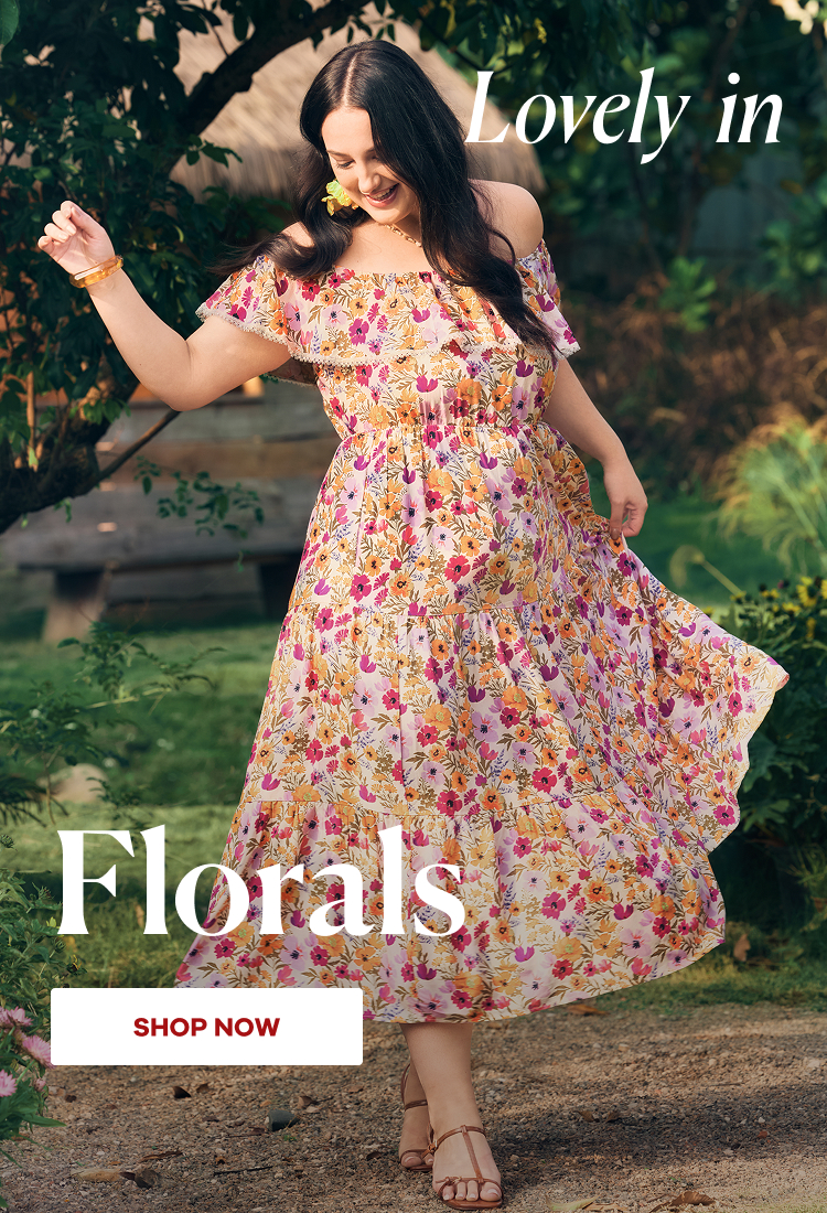 an image of a woman in a bikini posing with surfboards