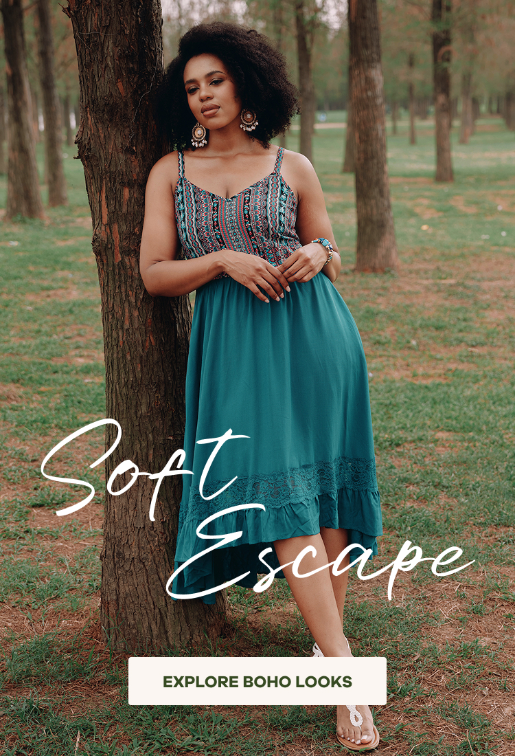 an image of a woman in a bikini posing with surfboards