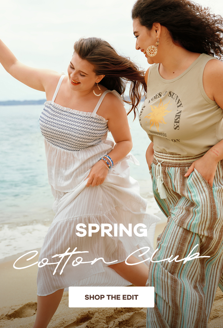 an image of a woman in a bikini posing with surfboards