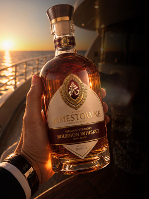 Person holding Jamewtowne limited release bottle