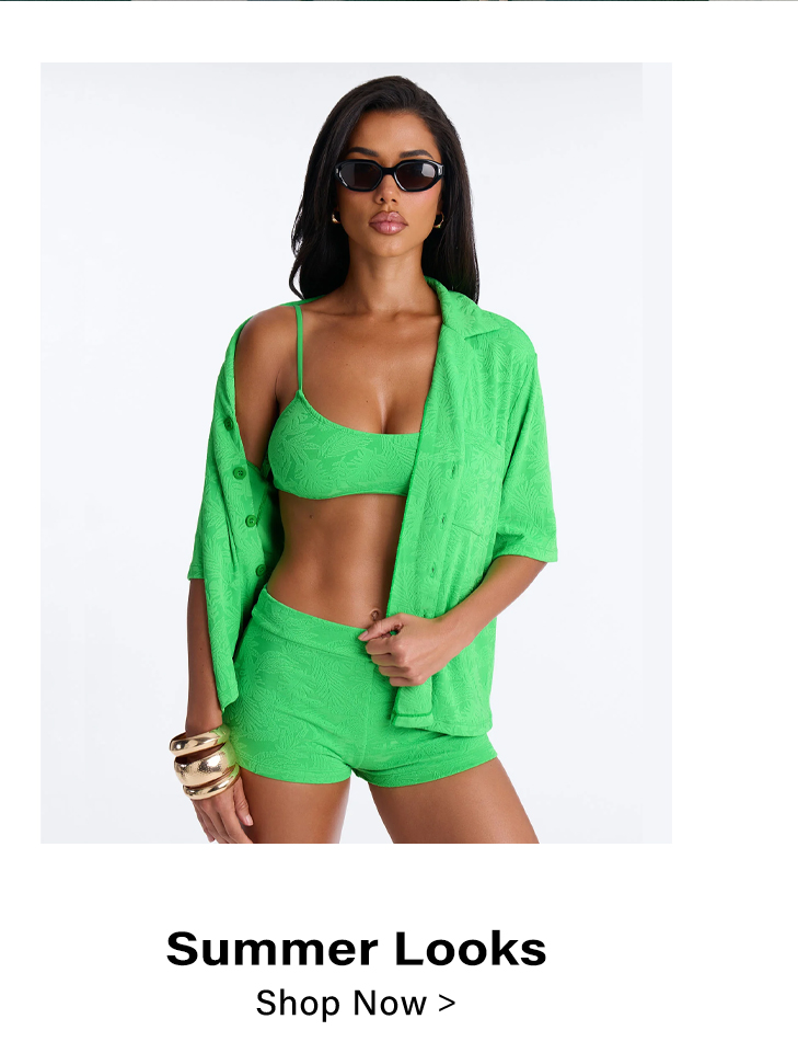 Woman in lime green textured summer outfit: bralette, shorts, open shirt, sunglasses. Shop summer looks.