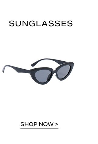 Black cat-eye sunglasses on white background with SUNGLASSES and SHOP NOW text, promoting the online store's trendy eyewear collection.