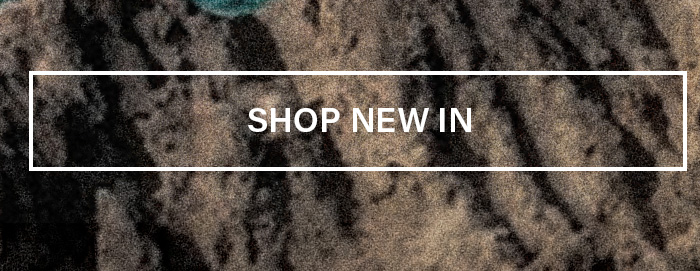 White 'SHOP NEW IN' button on a dark, textured background with tan and brown wavy patterns. Click to explore our latest collection and new arrivals.