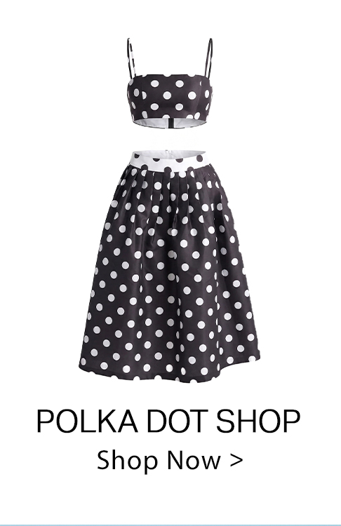 Black and white polka dot crop top with spaghetti straps and a matching pleated midi skirt. Explore the full polka dot collection.