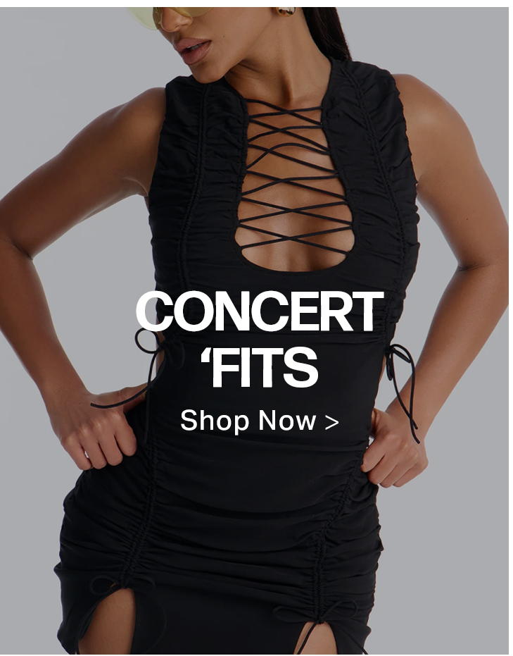 Black ruched lace-up mini dress on model. Shop trendy concert outfits & dresses now in our 'Concert Fits' collection for women.