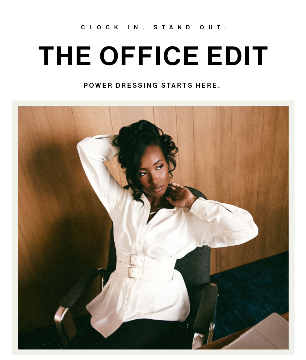 Stylish woman in a white belted shirt, embodying power dressing for The Office Edit. Professional workwear fashion.