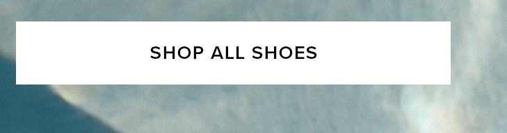 White "SHOP ALL SHOES" button on a subtle textured gradient of muted teal and grey. Browse our complete footwear collection now.