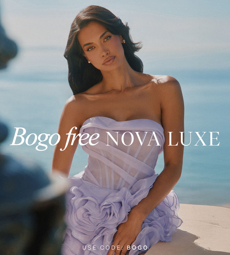 Nova Luxe BOGO free: Elegant model in lavender strapless ruffled corset dress. Shop luxury fashion deals now, use code BOGO.