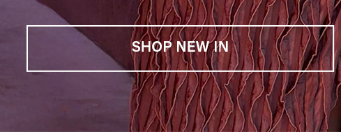 Close-up of a burgundy fashion garment with intricate wavy, layered fabric texture. "SHOP NEW IN" button for latest arrivals.