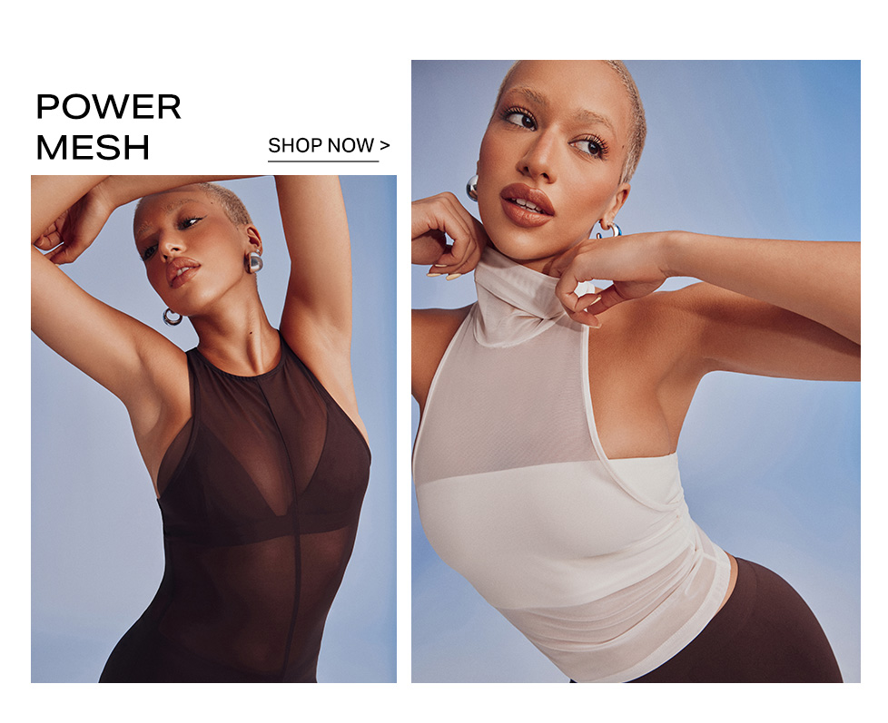 Shop the Power Mesh collection. Model poses in sheer black and cream high-neck tops against a blue background, inviting users to shop now.