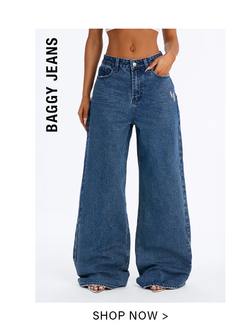 Model showcasing dark wash baggy jeans with wide legs, high waist, and subtle distressed pocket detail. Shop our stylish women's baggy jeans collection.
