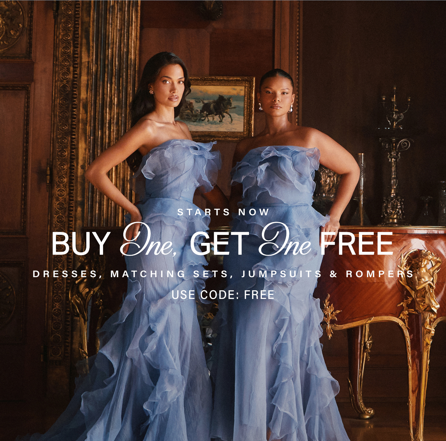 Two women in elegant periwinkle ruffle dresses against a luxurious backdrop. BOGO free on Dresses, Matching Sets, Jumpsuits & Rompers.
