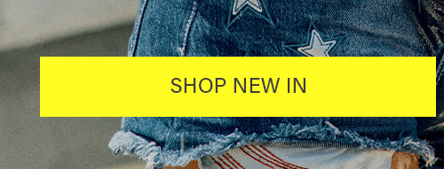 SHOP NEW IN button over trendy star-print denim shorts with frayed hems. Discover latest arrivals!