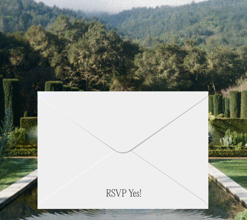 White invitation on a lush garden background promoting a Buy One, Get One Free offer on all wedding guest dresses. Use code BOGO.