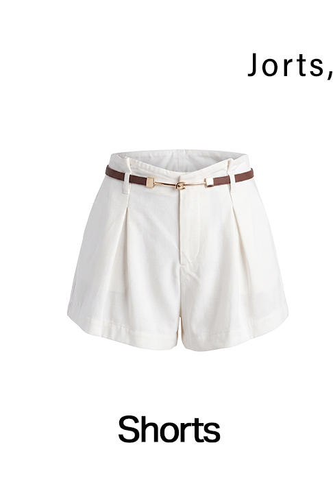 White pleated high-waisted shorts with a brown belt.