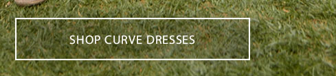 White call-to-action button on vibrant green grass reads 'SHOP CURVE DRESSES', encouraging users to browse our stylish collection of curve dresses.