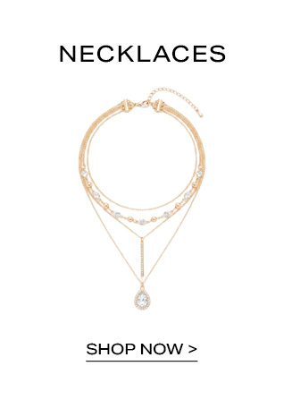 Layered gold necklace with a crystal teardrop pendant on a promotional banner for the women's necklaces collection with a shop now button.