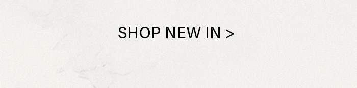 Black 'SHOP THE COLLECTION >' text on a light textured background. Click here to browse the latest styles and new arrivals within the collection.